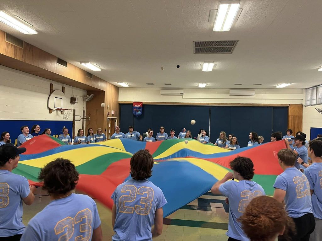 Today we had our graduating seniors the class of 2023 say goodbye to students and staff at IPS!  They even had the opportunity to play their favorite PE activity… the parachute!